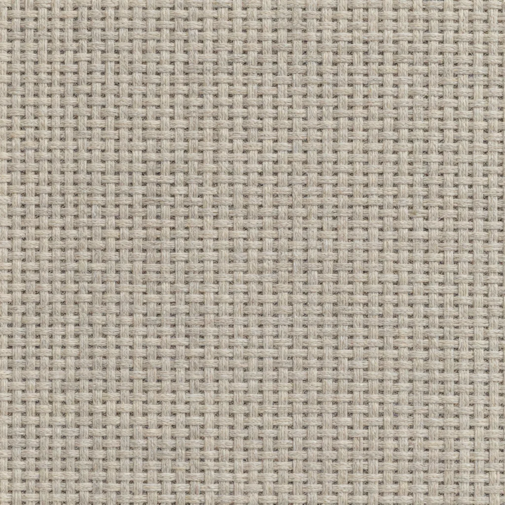 Textured surface pattern on a woven fabric in man-made yarns, soft even daylight across the weave, close-up editorial te